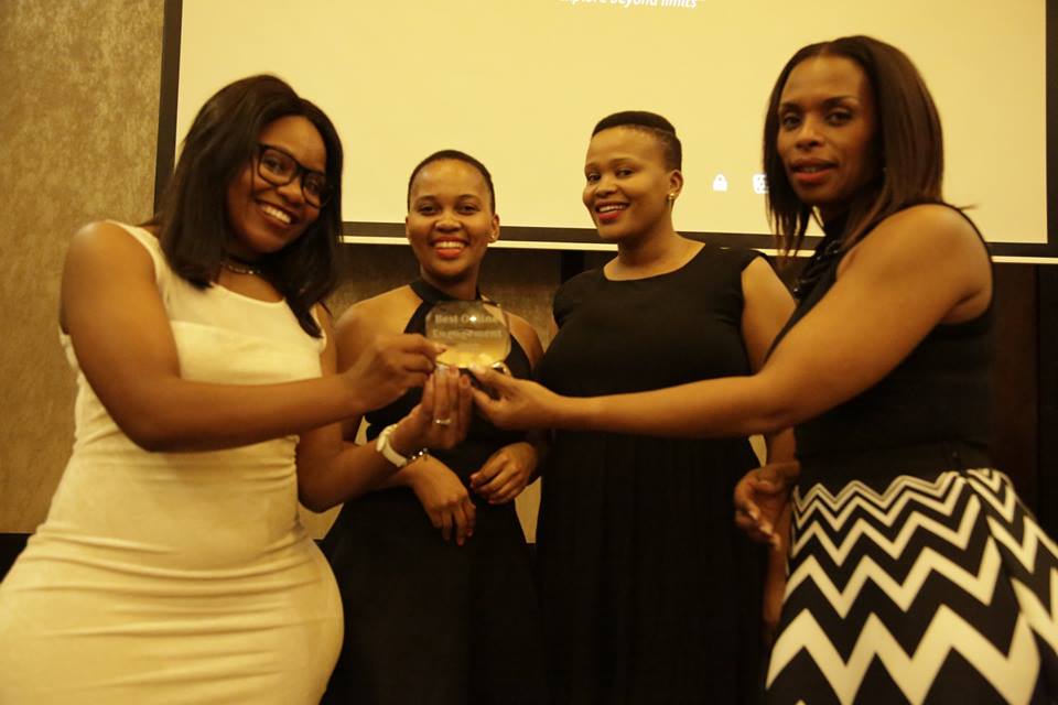 Multichoice Marketing team scoops the two coveted awards presented by Mamosa Makaya (right).