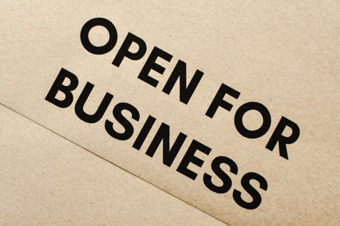 pexels-photo-6956129 close up shot of an open for business text on an envelope