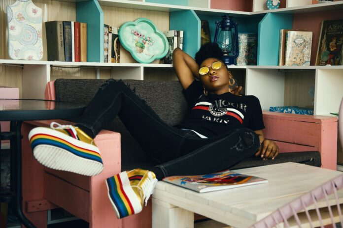 pexels-photo-993877 photo of woman sitting on couch