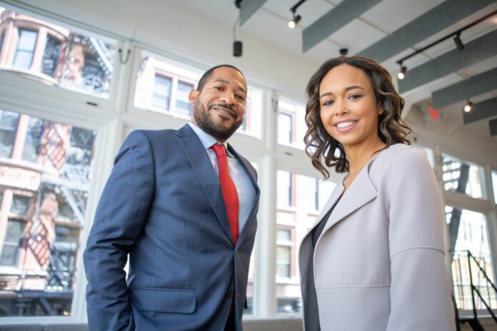 pexels-photo-1367269 man and woman smiling inside building