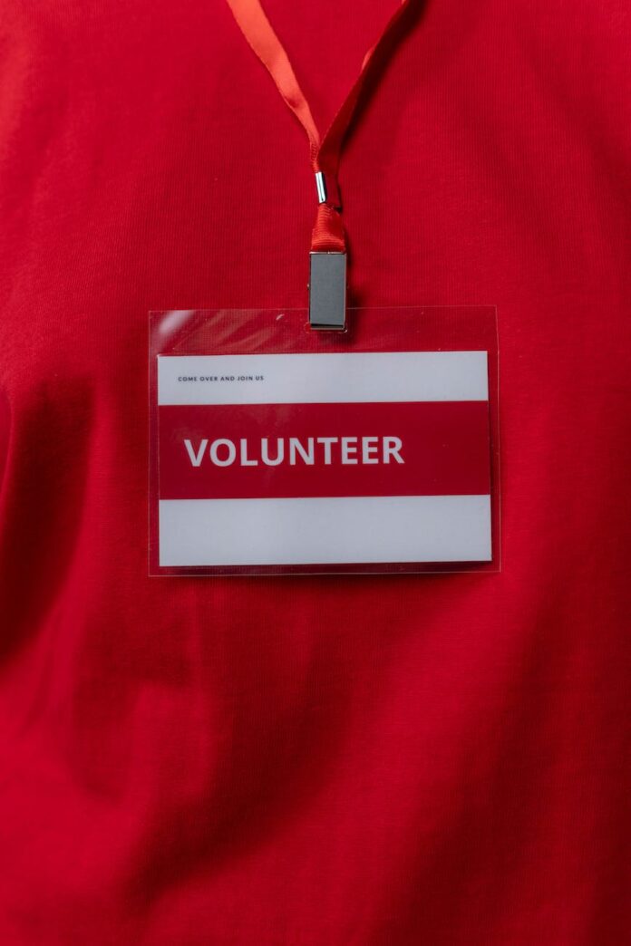 pexels-photo-6565756 close up photo of a volunteer id