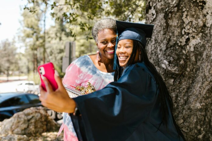 pexels-photo-7713358 women taking picture using a smartphone
