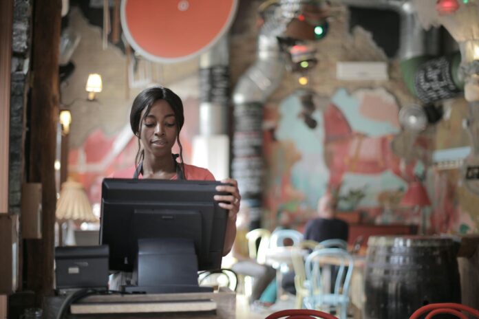 pexels-photo-3801429 cashier at a restaurant