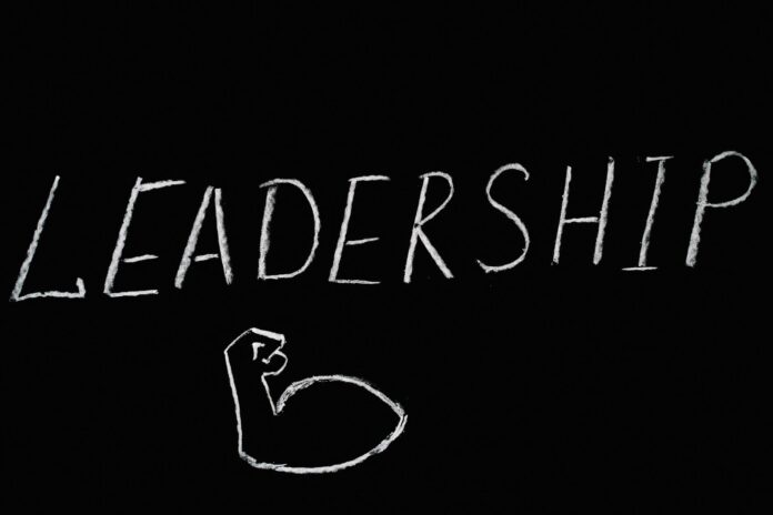 pexels-photo-5598287 leadership lettering text on black background