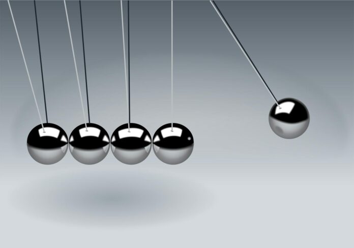 newton-s-cradle-balls-sphere-action-60582 gray newton s cradle in close up photogaphy