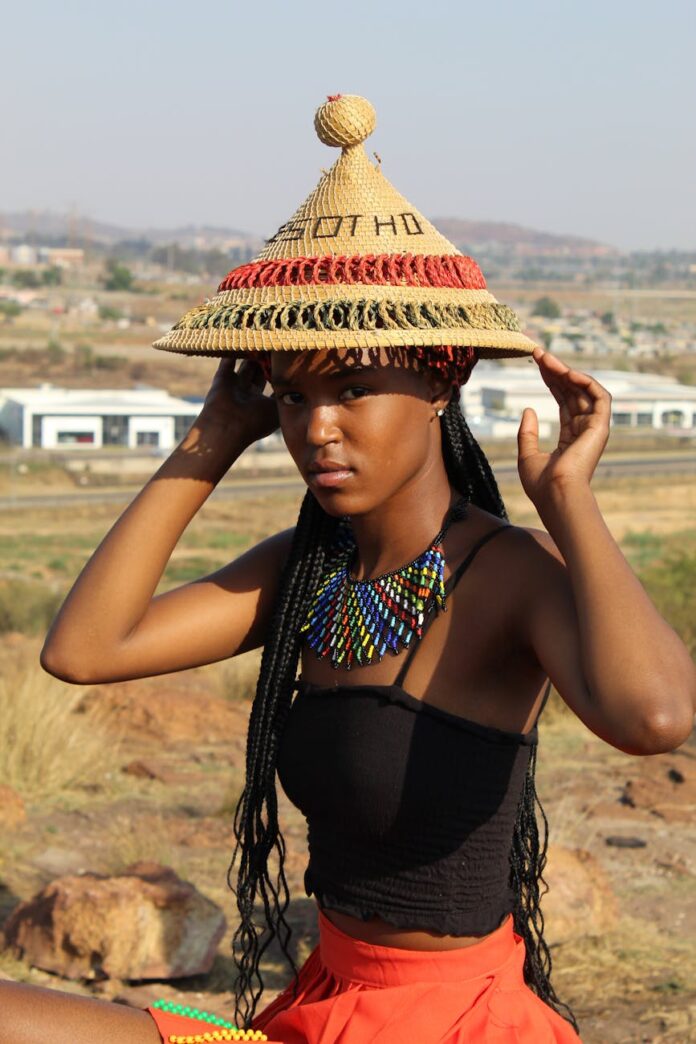 pexels-photo-11345982 woman in traditional hat and necklace