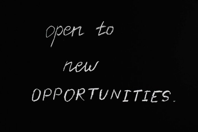 pexels-photo-5598293 open to new opportunities lettering text on black background