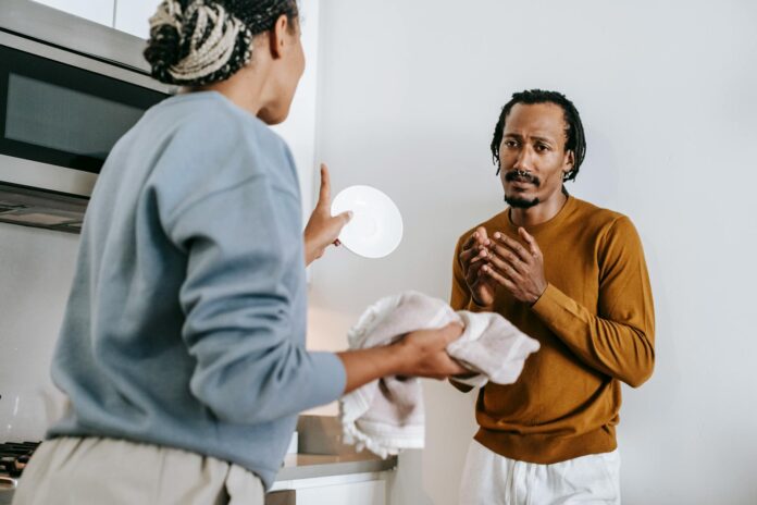 pexels-photo-5699718 black couple having conflict at home
