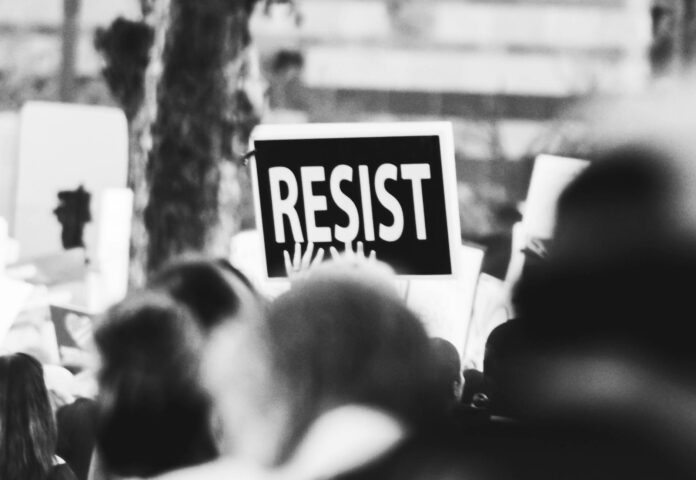 pexels-photo-3141240 monochrome photo of resist signage